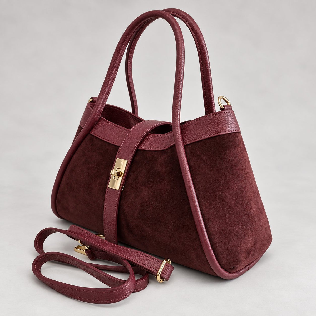 Geantă damă Ginevra vișinie din piele naturală întoarsă, model elegant de mână cu bareta crossbody detașabilă și accesorii aurii Made in Italy