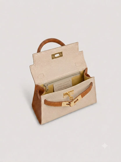 Poșetă bicolor crem și camel pentru femei din piele naturală Made in Italy, cu design modern, închidere metalică twist-lock și curea detașabilă. Geantă premium pentru damă, perfectă pentru outfituri elegante, business, casual și evenimente speciale.