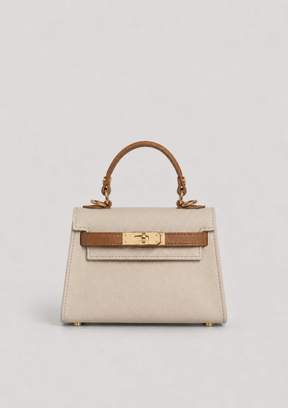 Geantă elegantă bicolor crem și camel din piele naturală pentru damă, cu finisaje premium, accesorii aurii și compartiment interior practic. Poșetă Made in Italy, ideală pentru ținute de zi, office, întâlniri, petreceri și stil casual elegant.