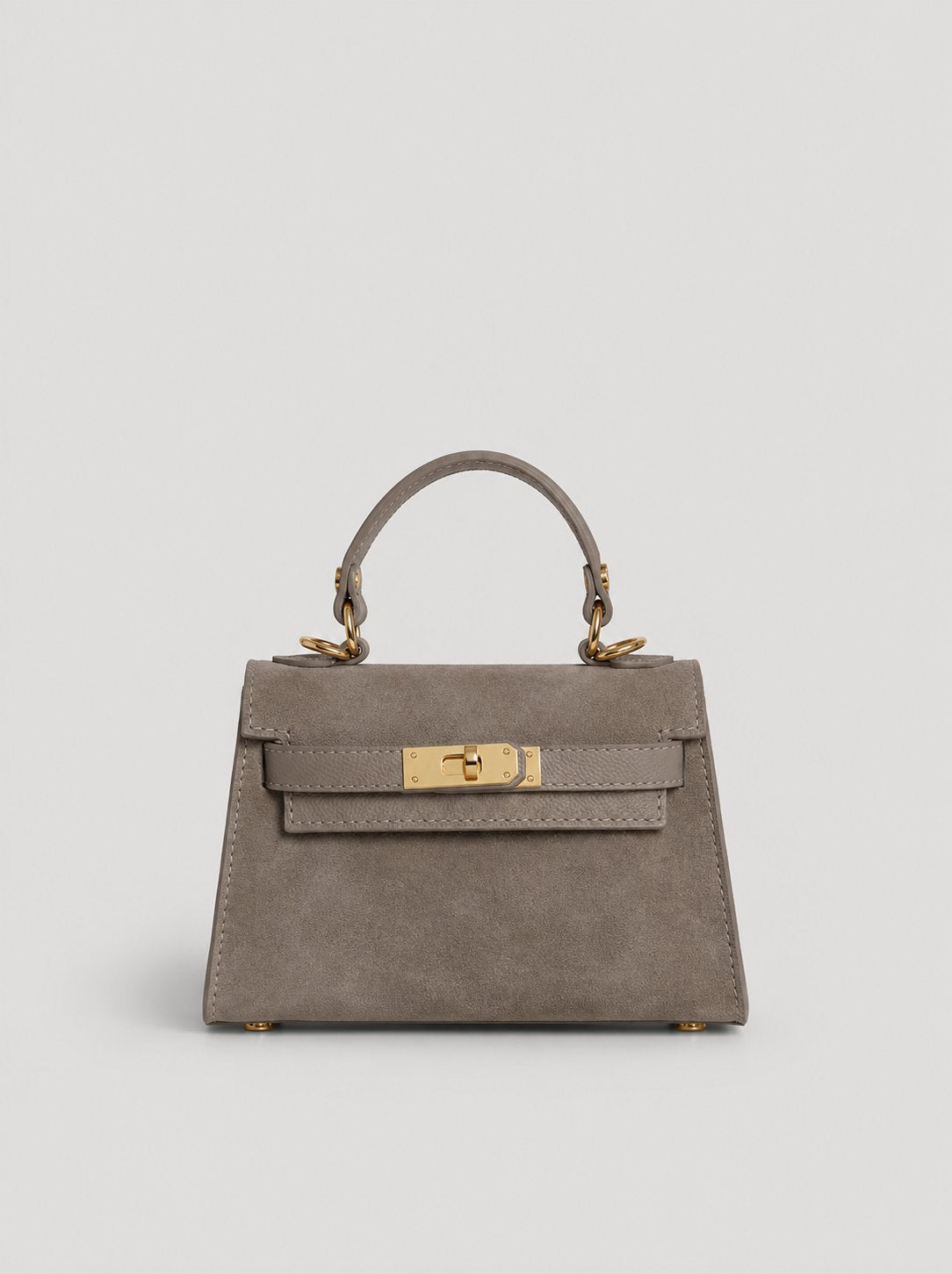 Geantă damă din piele naturală întoarsă taupe, fabricată în Italia, cu accesorii metalice aurii, compartiment interior practic și curea ajustabilă pentru purtare pe umăr sau crossbody. Poșetă elegantă din piele velur pentru femei, potrivită pentru birou, oraș și ocazii speciale.