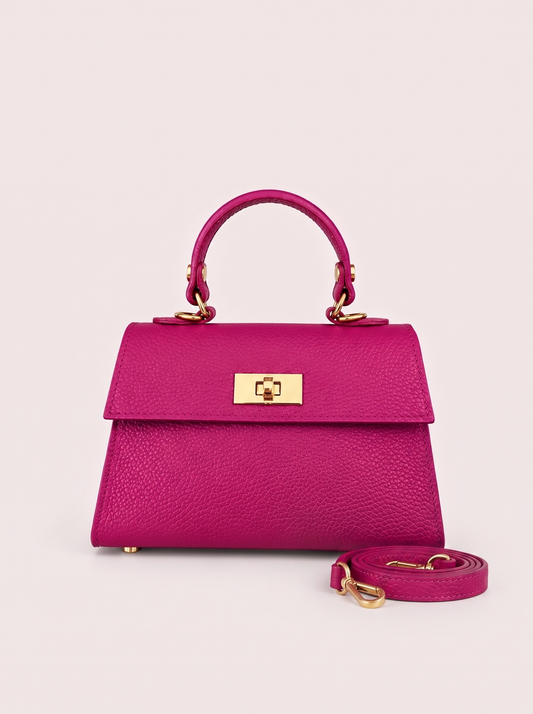 Poșetă Emilia fucsia din piele naturală pentru damă, fabricată în Italia, cu design elegant, accesorii metalice aurii și mâner superior, ideală pentru ținute elegante, evenimente speciale și ieșiri în oraș.