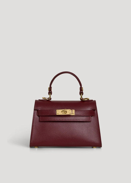 Poșetă damă bordo din piele naturală premium, Made in Italy, cu închidere twist-lock aurie și curea reglabilă și detașabilă. Geantă elegantă din piele naturala pentru femei, ideală pentru ținute office, casual chic, evenimente, petreceri și utilizare zilnică.