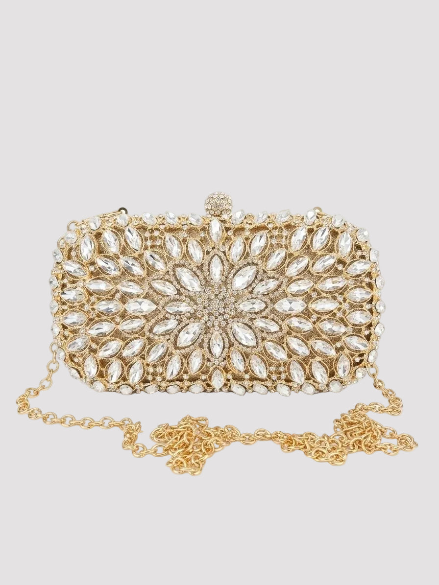 Poșetă clutch aurie de ocazie cu design luxury, împodobită cu cristale și pietre decorative strălucitoare, lanț metalic auriu detașabil și finisaje premium, ideală pentru rochii elegante și apariții rafinate la evenimente speciale.
