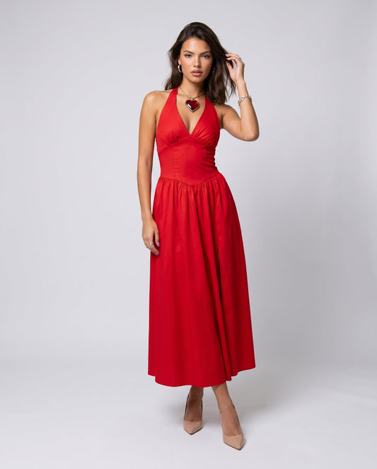 Rochie lungă de vară roșie pentru damă, cu decolteu în V, șliț înalt pe picior și croială vaporoasă, fabricată în Italia. Rochie elegantă pentru femei, perfectă pentru vacanțe, nunți, botezuri, petreceri în aer liber și evenimente speciale din sezonul cald.
